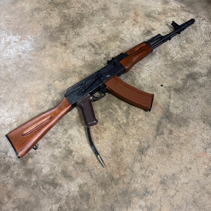 Used AK74 airsoft rifle with PolarStar F2 custom build, angled view